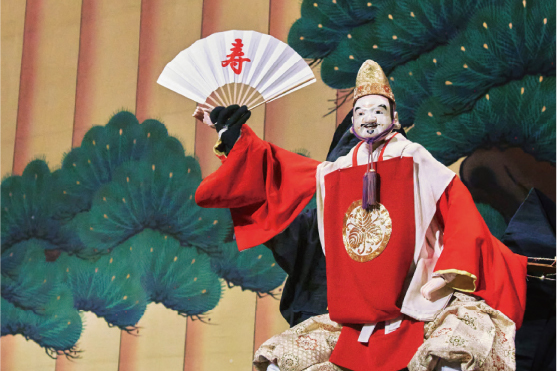 Traditional Awaji Ningyo puppet in ornate red and gold ceremonial costume, representing the island's rare and living performance art heritage