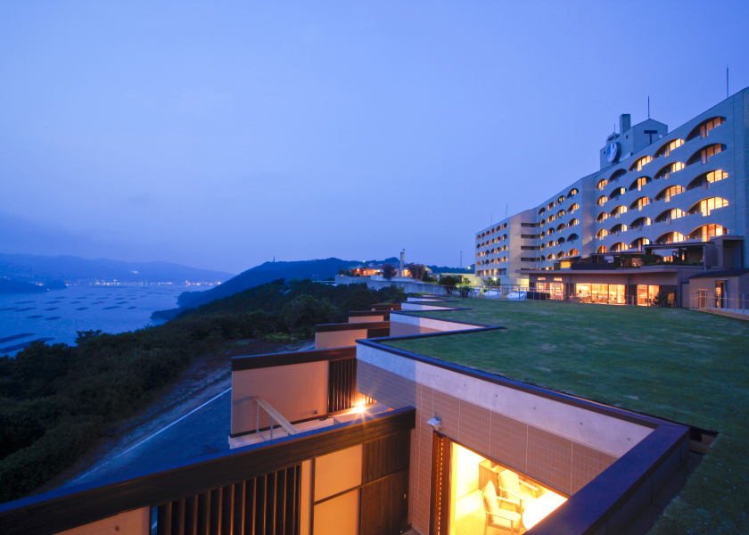 Hotel New Awaji Plaza Awajishima elevated terrace view over coastline, showcasing expansive sea views and resort scale