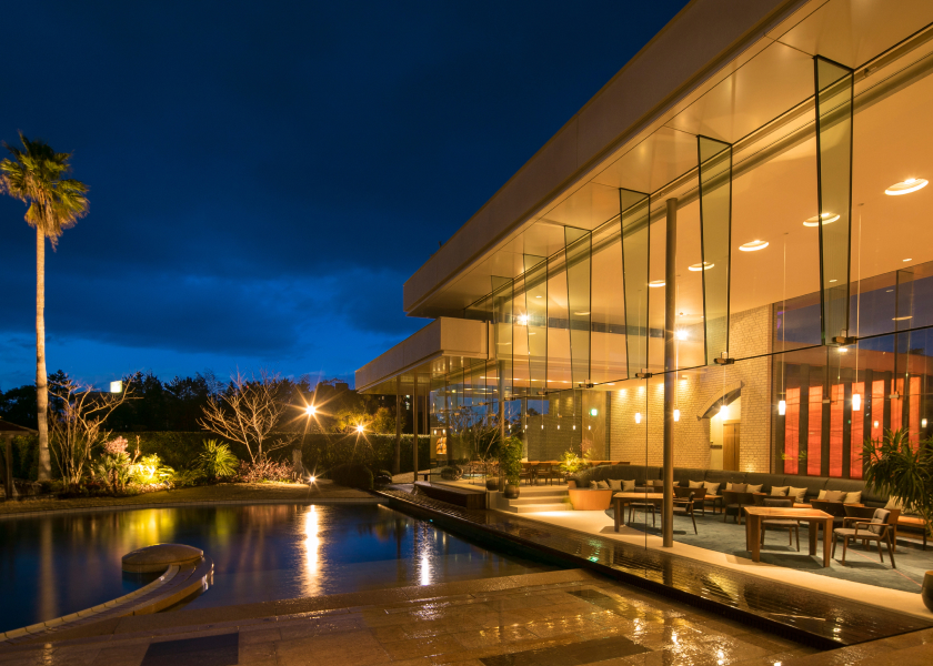 Umi no Hotel Shimahana Residence Villa modern glass exterior with water reflections, offering a private and design-forward stay experience