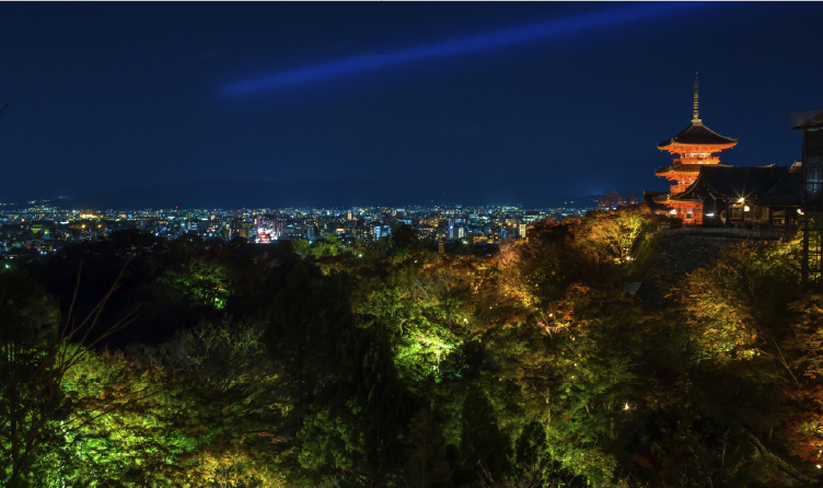 Kiyomizudera Temple overlooking Kyoto city at dusk, offering panoramic views and a historic cultural landmark experience