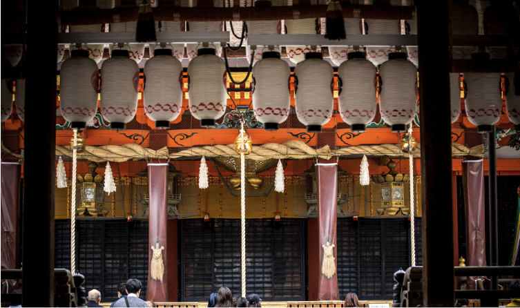 Lantern-lit shrine architecture in Gion Kyoto, connecting spiritual heritage with the vibrant historic district