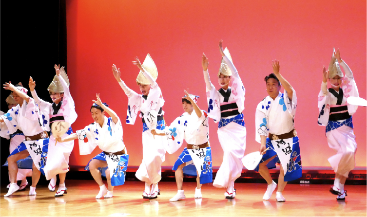 Performers in traditional costume dancing Awa Odori in Tokushima, showcasing a lively and immersive cultural performance