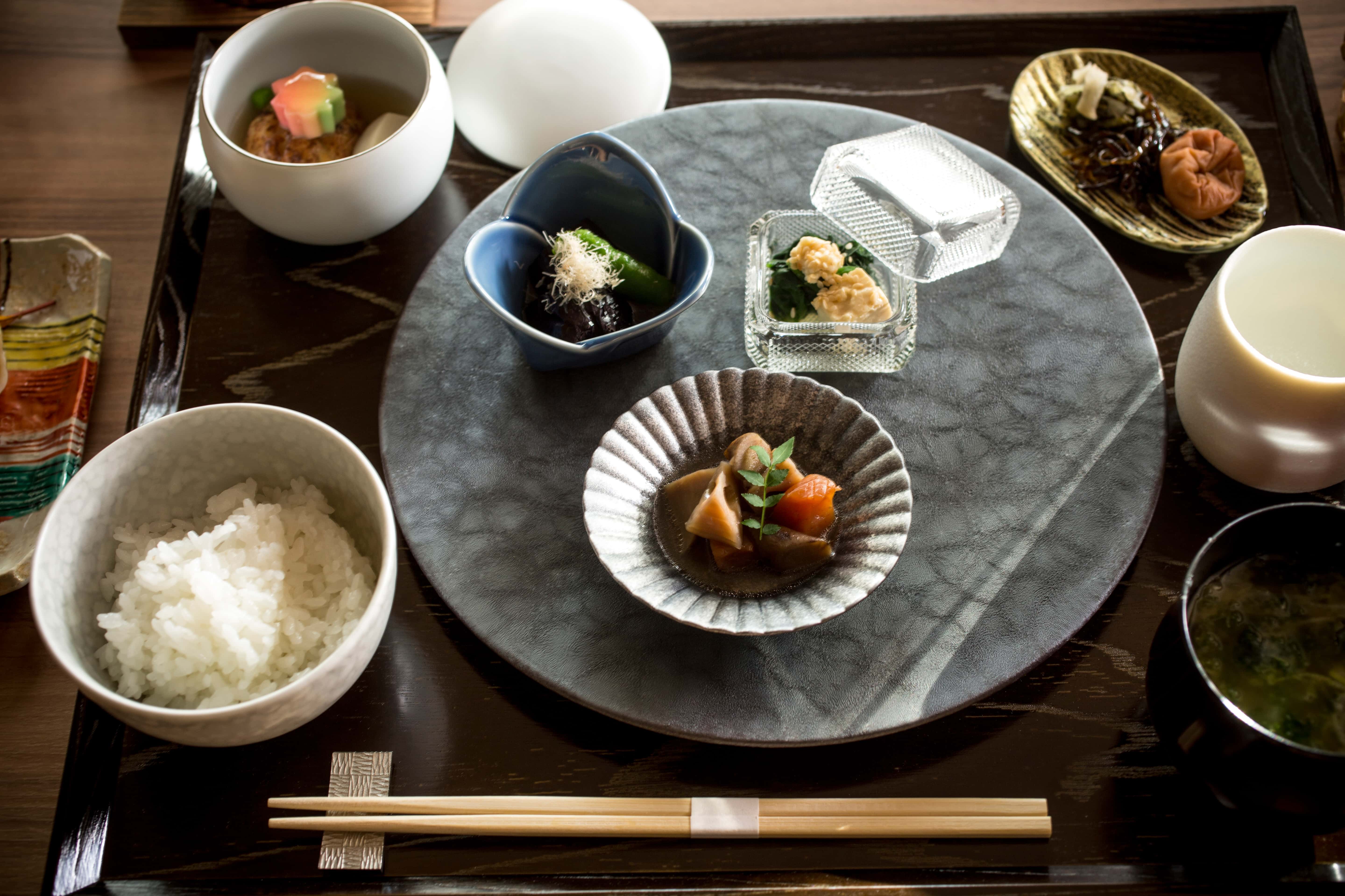Kaiseki meal set with seasonal dishes and rice, traditional Japanese dining featuring Awaji Island ingredients