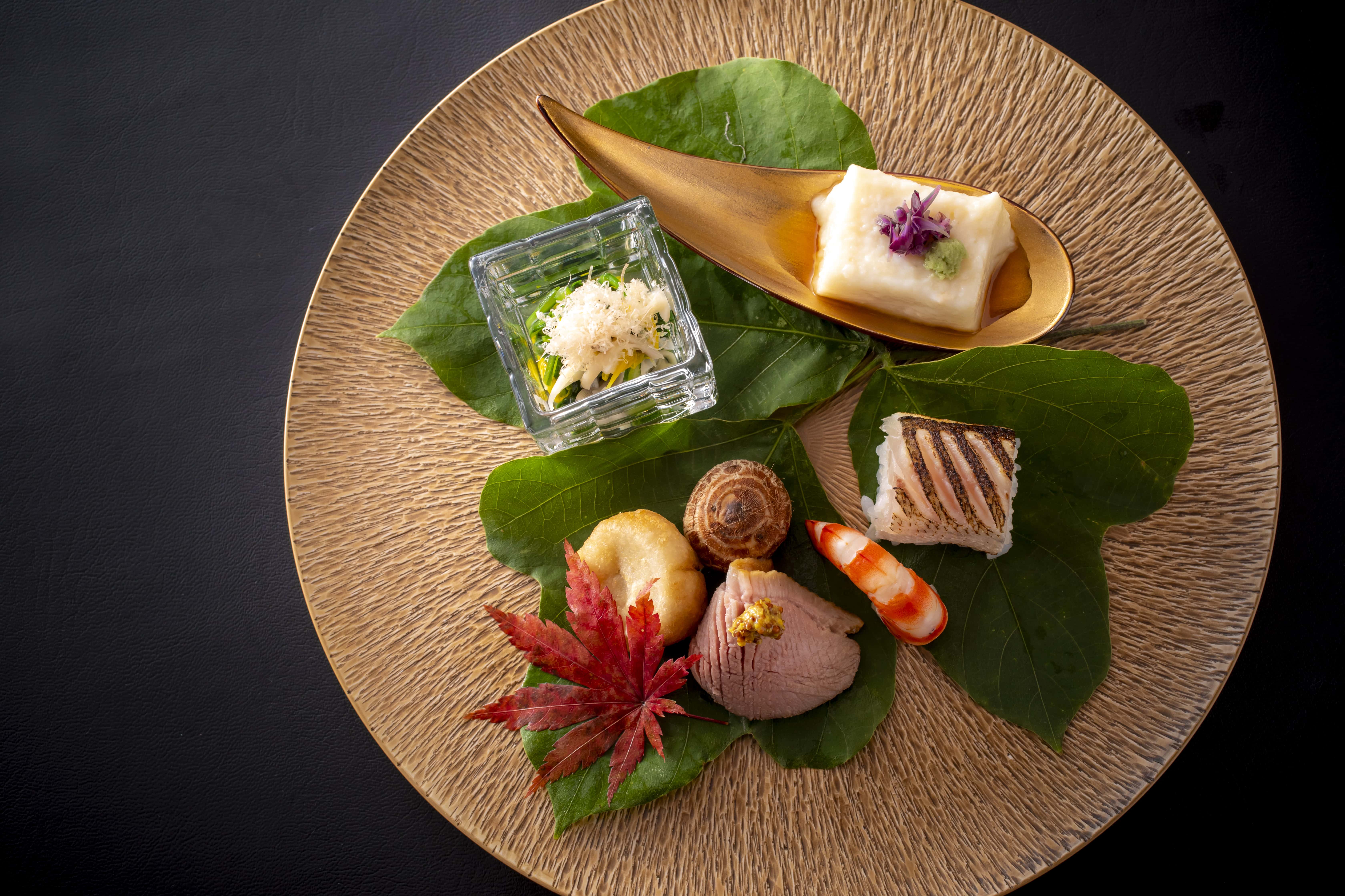 Seasonal kaiseki appetizer platter with refined presentation, Japanese fine dining inspired by Awaji Island cuisine