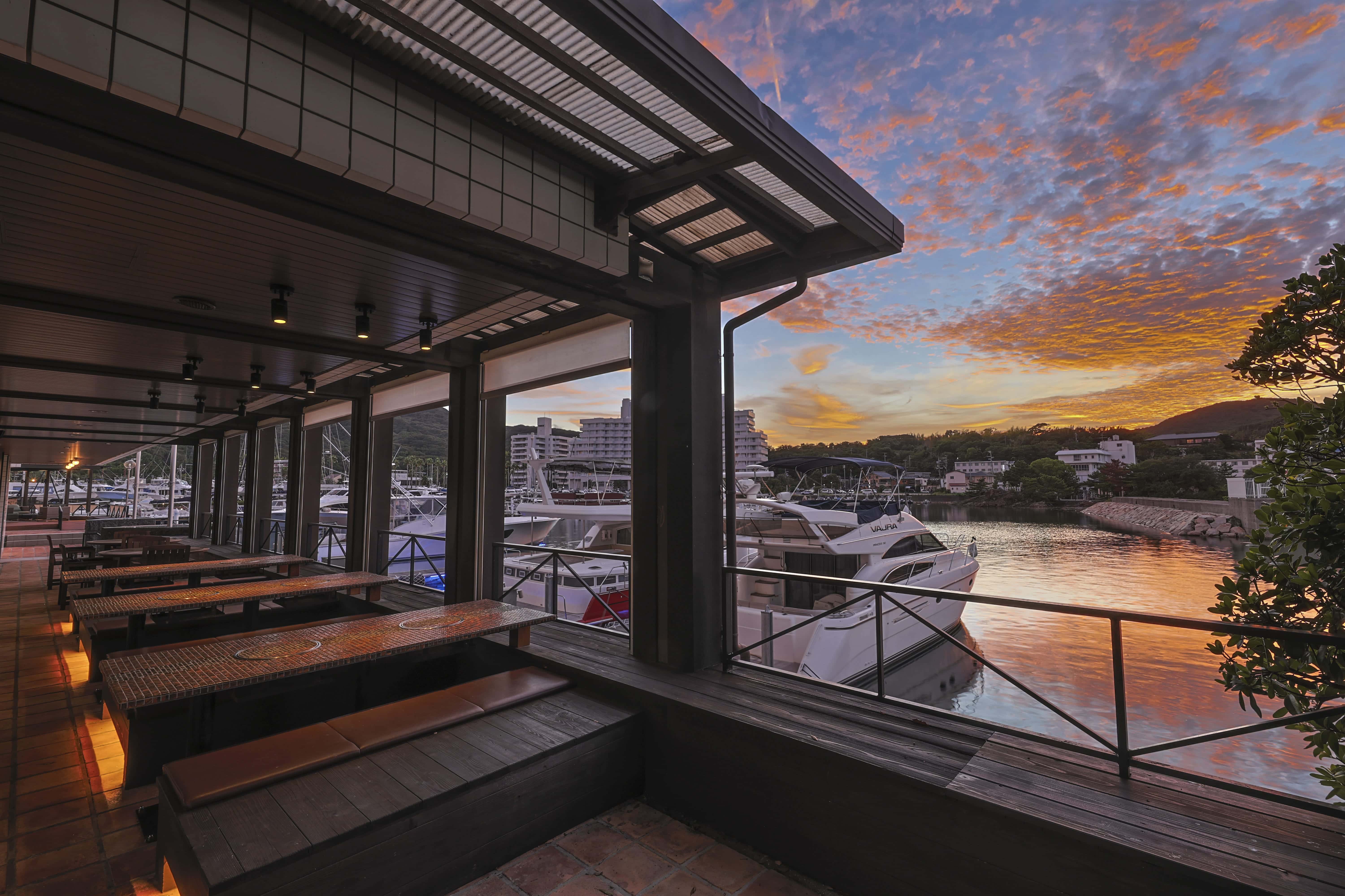 Outdoor pool at dusk with ambient lighting at Hotel New Awaji, luxury resort on Awaji Island Japan