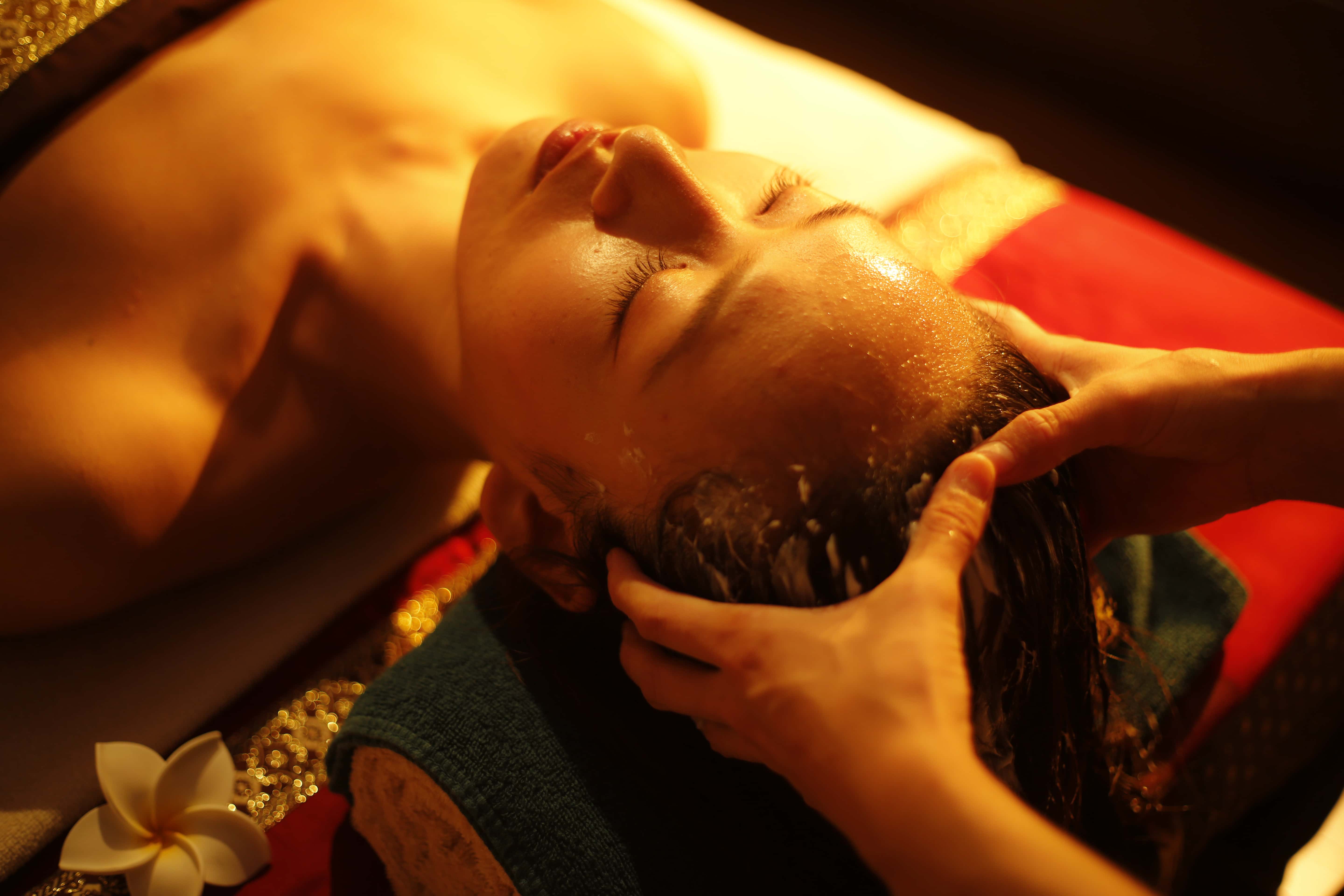 Head massage spa treatment with warm lighting, Japanese relaxation therapy experience