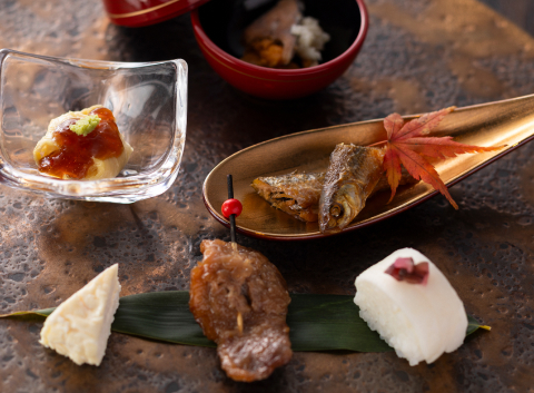 Seasonal kaiseki course featuring traditional Japanese dishes with local Lake Biwa ingredients, served in an elegant multi-course dining experience