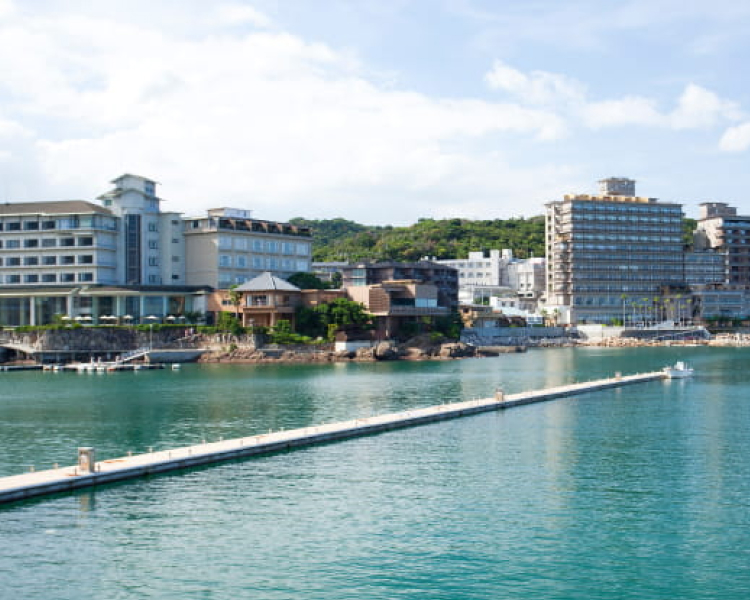 Seaside hotel on Awaji Island in Japan with waterfront views and pier extending into the ocean