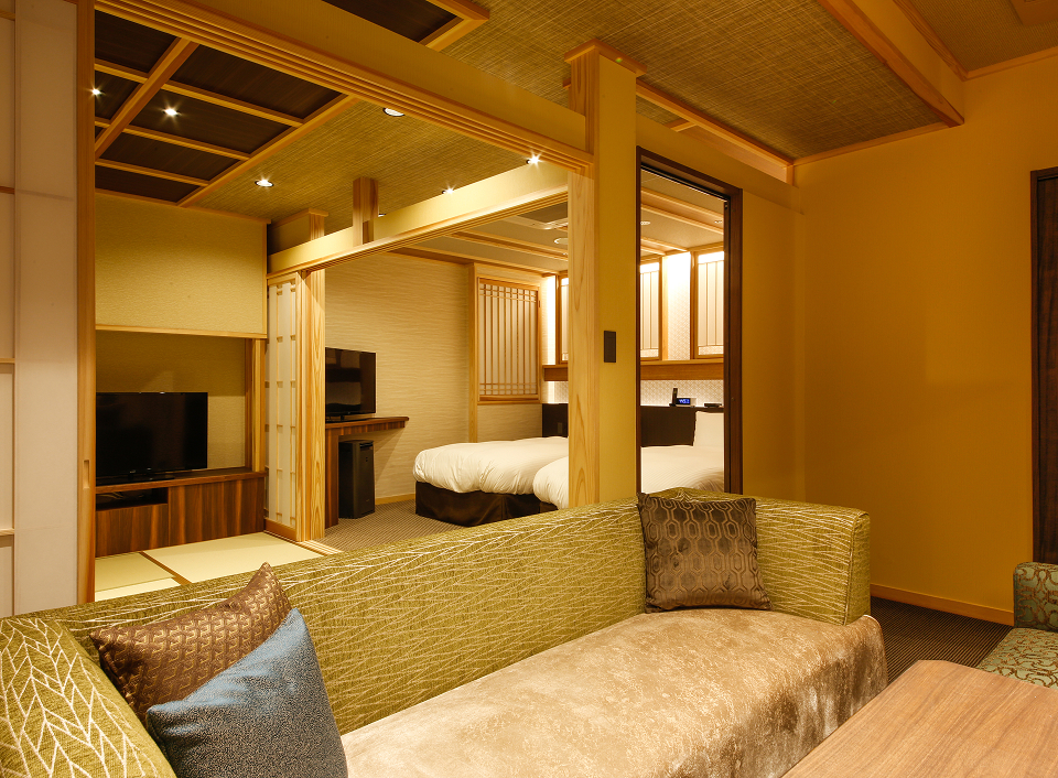 Awaji Hamarikyu Besso Takumi suite with modern Japanese design and soft lighting, offering an exclusive and elevated stay
