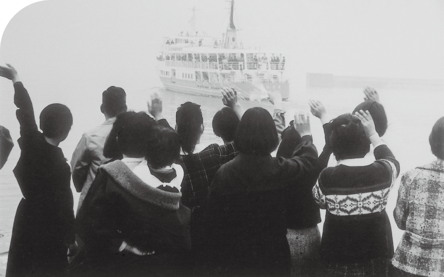 Historic Japan hospitality scene guests waving to ship traditional travel culture Hotel New Awaji history