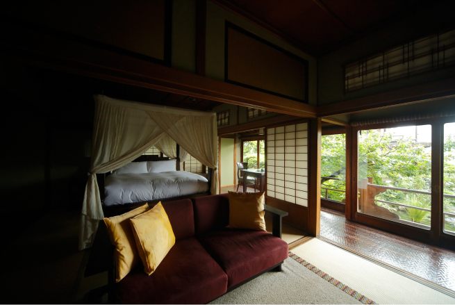 Detached villa Chosenden at Saka-Hotel Kyoto with dark wood beams, traditional sliding screens, and private garden views, offering a deeply immersive and secluded Shikoku retreat
