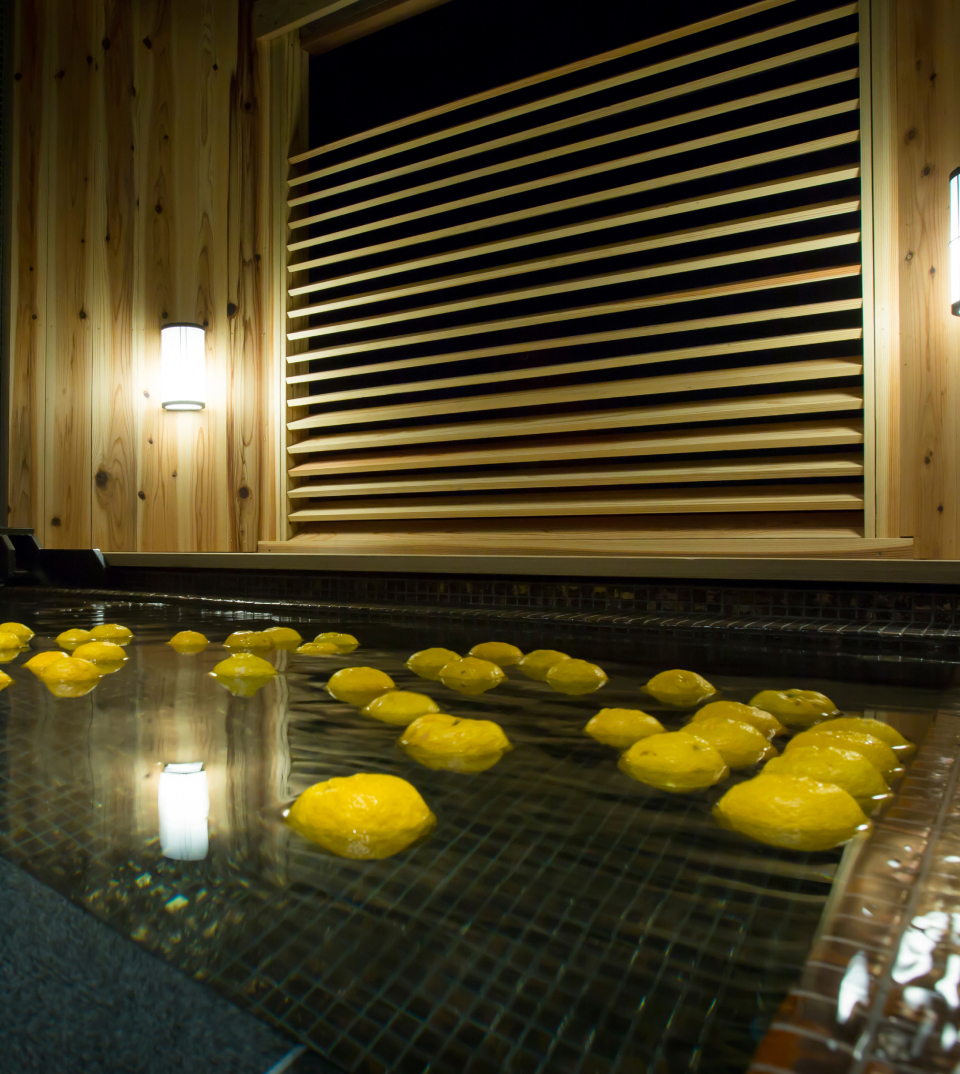 Citrus yuzu onsen bath in a Japanese spa on Awaji Island for seasonal wellness experience